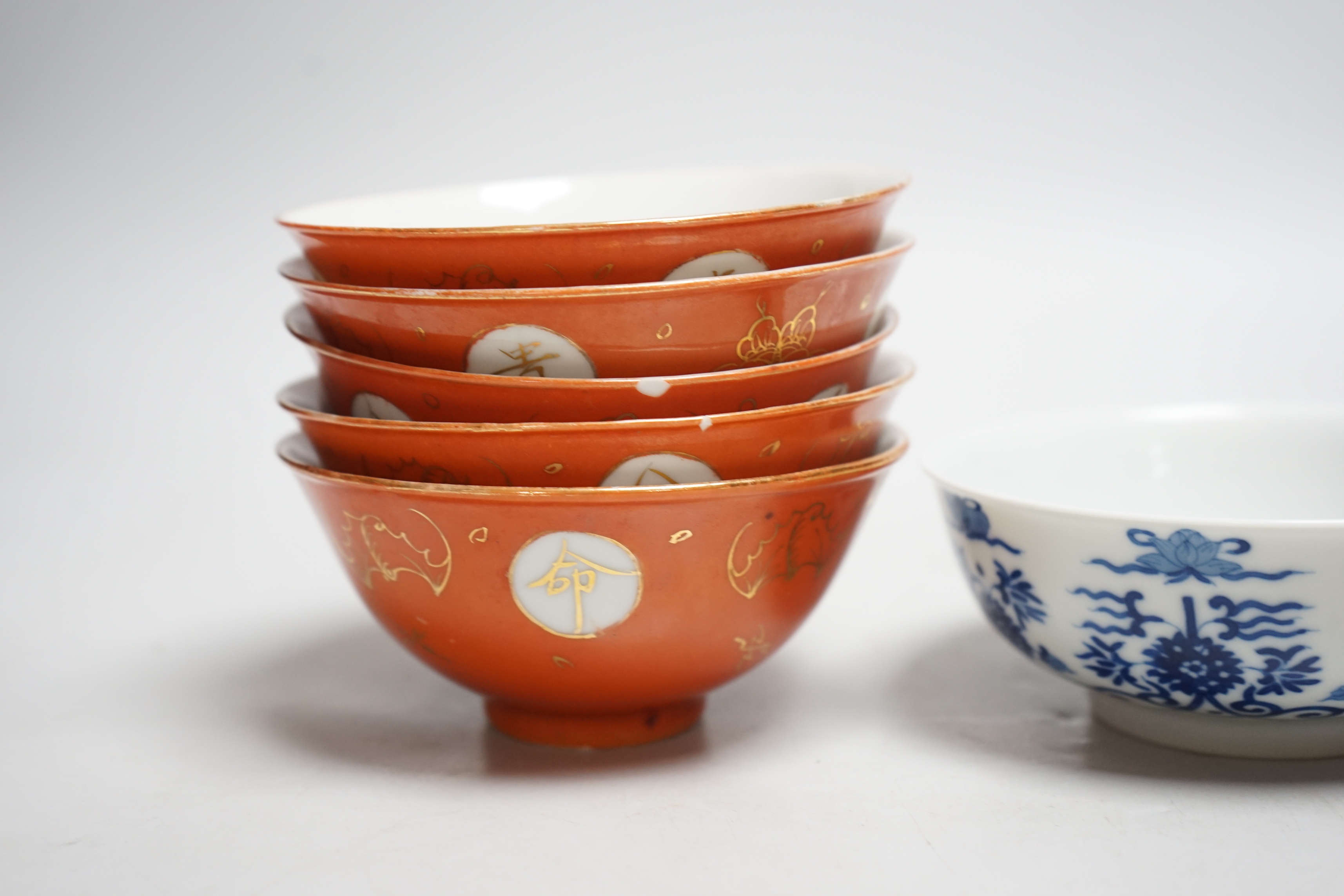 Five Chinese coral ground bowls and a blue and white bowl, 13cm (6)